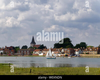 Sailing boat on Chichester harbour at Bosham, West Sussex, UK on a sunny summer day. Stock Photo