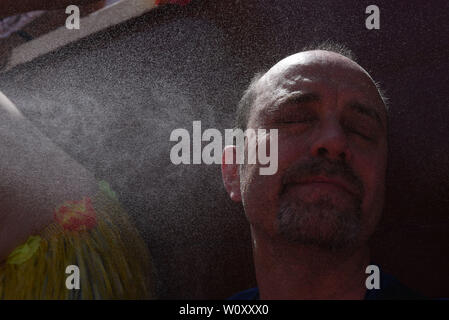 Soria, Soria, Spain. 28th June, 2019. A man cools off with water as temperatures reached 36Âº degrees Celsius during the Viernes de Toros Celebration in Soria.The first heat wave of summer, which has claimed lives continues in Spain. Spanish's weather agency AEMET forecasts show today is set to be the worst day for severe hot weather with temperatures up to 42C in several regions. Credit: SOPA Images/ZUMA Wire/Alamy Live News Stock Photo