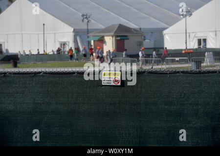 HOMESTEAD, FLORIDA - JUNE 27: Atmosphere of facility holding migrant children in front of a detention center. The controversial for-profit detention center holds around 2,300 children from the ages of 13 to 17, who have been placed in the care of the Department of Health and Human Services after being detained at the border on June 27, 2019.on June 26, 2019 in Homestead Florida   People:  Atmosphere Stock Photo