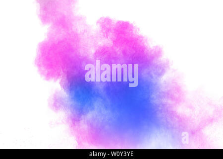 Bizarre forms of blue pink powder explosion on white background. Stock Photo