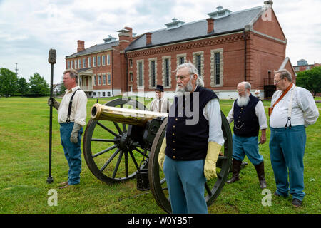 Fort Smith, Arkansas - Fort Smith National Historic Site. Volunteers practice their procedure for loading and firing a cannon. Stock Photo