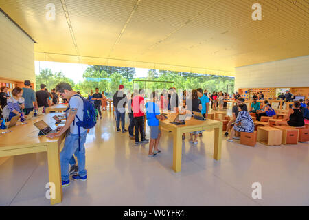 Cupertino, CA, United States - August 12, 2018: interior with many customers in the new Apple store and HQ of Apple Park Visitor Center, Tantau Avenue Stock Photo