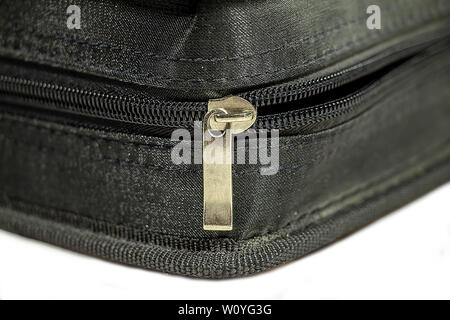 Zipper case. Black closed zipper case isolated on white background Stock Photo