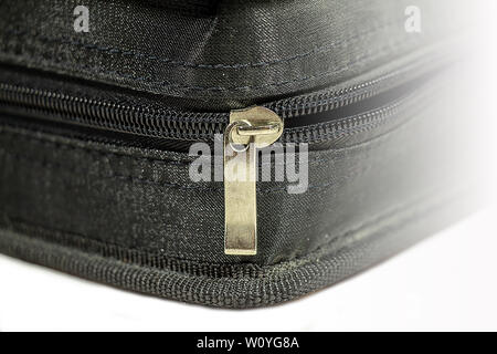 Zipper case. Black closed zipper case isolated on white background Stock Photo