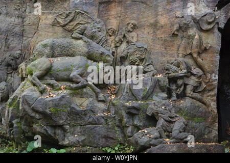 Abandoned relief 'Nativity of Jesus' in the area of the open air sculptural gallery known as the Braunův Betlém (Braun's Bethlehem) in the forest near the village of Žireč in East Bohemia, Czech Republic. The monumental relief was carved by famous Austrian-born sculptor Matthias Bernhard Braun (Matyáš Bernard Braun) from 1726 to 1734 among other statues and relieves directly in sandstone rocks in the New Forest near the Kuks Hospital (Nový les u Kuksu). The Braunův Betlém is considered to be one of the masterpieces of Bohemian Baroque sculpture. Stock Photo