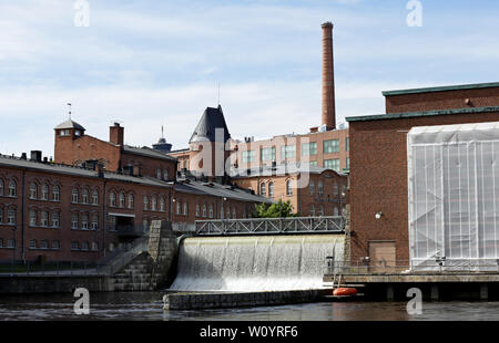 Tampere Finland 06/12/2019  Tammerkoski (rapids in Tampere) flowing in the area of  Tampella and Finlayson Stock Photo