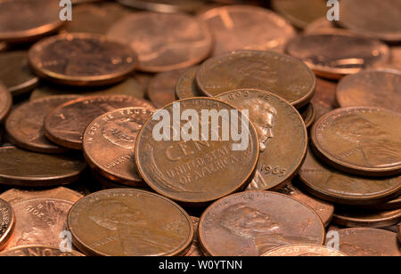 stacked coins, pennies, lined up in rows Stock Photo