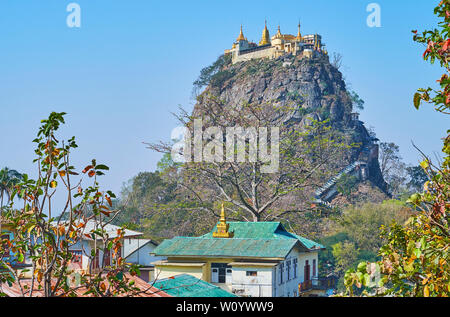 The rock at the Mount Popa is often named as the main volcanic mountain, it's the famous place of pilgrimage, Buddhist devotees visit the Taung Kalat Stock Photo