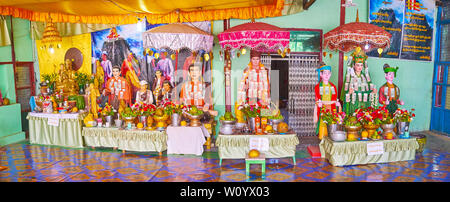 POPA, MYANMAR - FEBRUARY 26, 2018: The statues of Nats (spirits) in interior of Popa Medaw and 37 Kings Nathan Shrine, located at Mount Popa Buddhist Stock Photo