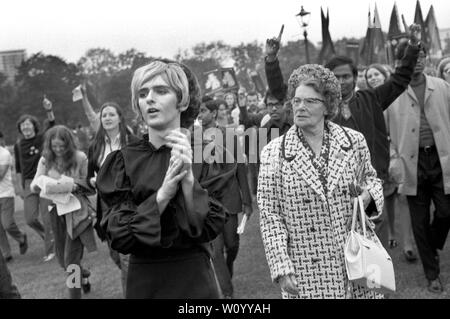 Gay Liberation Front - Gay Liberation Movement, man cross dressing demonstrated against the Nationwide Festival of Light, older woman angry with man dressed as a young woman Hyde Park London rally September 1971 LGBTQ 1970s UK HOMER SYKES Stock Photo