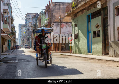 Cuban people and a bicitaxi in Havana, Cuba Stock Photo - Alamy