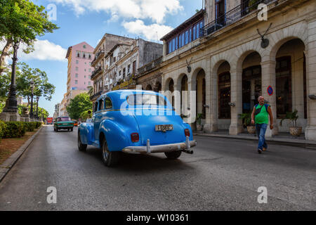 Havana, Cuba - May 13, 2019: Classic Old Car in the streets of the Old Havana City during a vibrant and bright sunny morning. Stock Photo