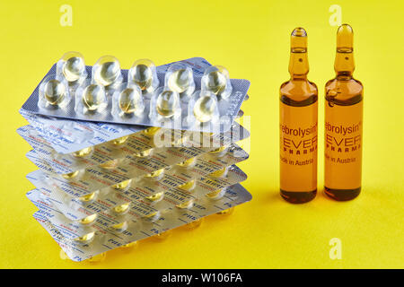 Download Yellow Fish Oil Capsule Pills With Amber Glass Bottle With Blank Stock Photo Alamy Yellowimages Mockups