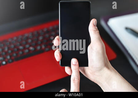 right hander man using his smartphone. concept. Working place of lefty. Work and study table concept. close-up view. free copy space Stock Photo