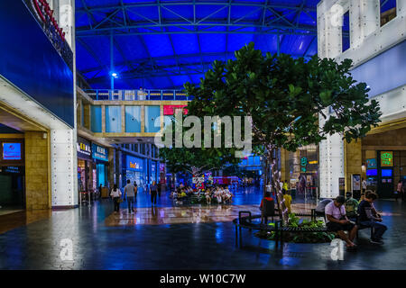 Singapore - Jun 10, 2019: Unidentified people sightseeing and resting infront of entrance to Resorts World Convention Centre. Stock Photo