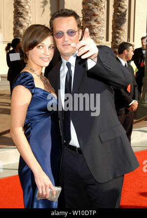 Matthew Perry and Rachel Dunn at the 2004 Primetime Creative Arts Emmy ...