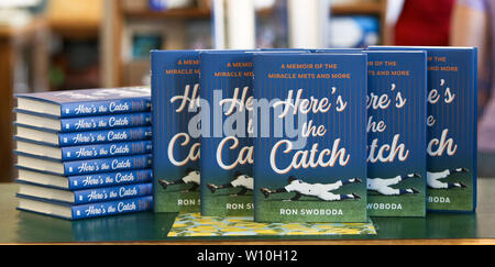 HUNTINGTON, NY - JUN 26: Copies of 'Here's The Catch' by former baseball player Ron Swoboda at Book Revue on June 26, 2019. Stock Photo