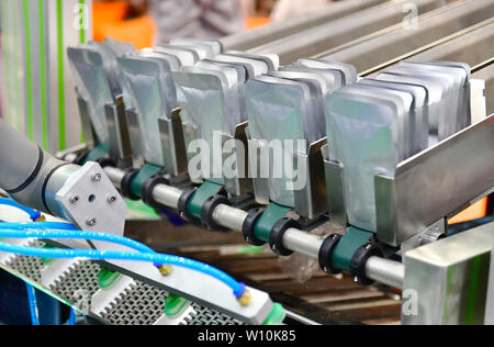 Aluminium Foil Bag Packaging at Industrial Modern machine for packaging line Stock Photo
