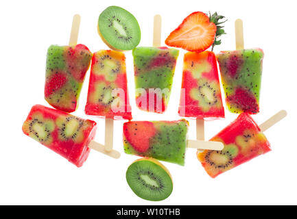 funny handmade ice popsicles decorated kiwi and strawberry isolated on white background, concept vegetarian food Stock Photo