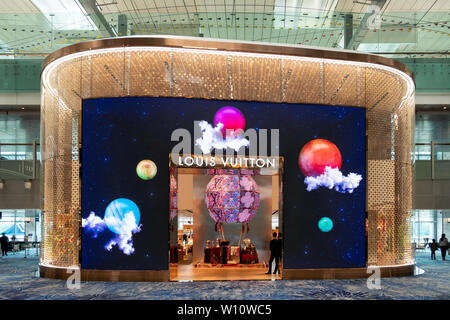 Changi, Singapore - Sep 08 2018 : Front architecture of store brand louis vuitton design with light illumination design. brand about of fashion, bag, Stock Photo