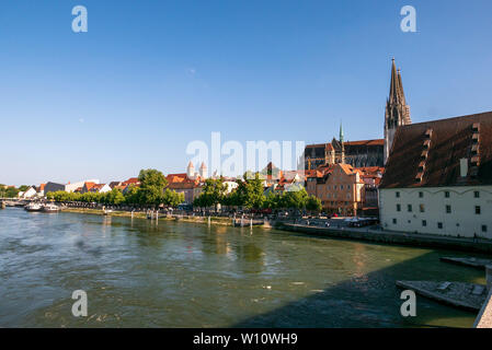 REGENSBURG, GERMANY - JUNE 13, 2019: Regensburg cityscape as viewed from the medieval Stone Bridge (Steinerne Brücke) over the Danube river. The medie Stock Photo