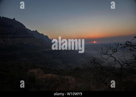 Thana district Maharashtra  March 13-2005 Silhouette of a malshej ghat and mountain ranges in the Western Ghats INDIA asia Stock Photo