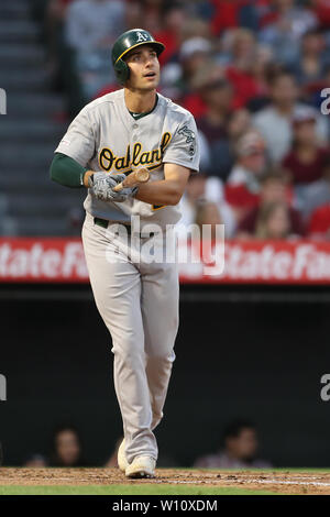 Anaheim, California, USA. 28th June 2019. Oakland Athletics first baseman Matt Olson (28) watches as his second homer leave the park during the game between the Oakland A's and the Los Angeles Angels of Anaheim at Angel Stadium in Anaheim, CA, (Photo by Peter Joneleit, Cal Sport Media) Credit: Cal Sport Media/Alamy Live News Stock Photo