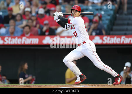 Anaheim, California, USA. 28th June 2019. Los Angeles Angels designated hitter Shohei Ohtani (17) watches as his deep fly comes up short during the game between the Oakland A's and the Los Angeles Angels of Anaheim at Angel Stadium in Anaheim, CA, (Photo by Peter Joneleit, Cal Sport Media) Credit: Cal Sport Media/Alamy Live News Stock Photo