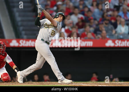 Anaheim, California, USA. 28th June 2019. Oakland Athletics first baseman Matt Olson (28) watches as his second homer leave the park during the game between the Oakland A's and the Los Angeles Angels of Anaheim at Angel Stadium in Anaheim, CA, (Photo by Peter Joneleit, Cal Sport Media) Credit: Cal Sport Media/Alamy Live News Stock Photo