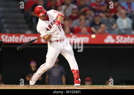 Anaheim, California, USA. 28th June 2019. Los Angeles Angels center fielder Mike Trout (27) connects at the plate during the game between the Oakland A's and the Los Angeles Angels of Anaheim at Angel Stadium in Anaheim, CA, (Photo by Peter Joneleit, Cal Sport Media) Credit: Cal Sport Media/Alamy Live News Stock Photo