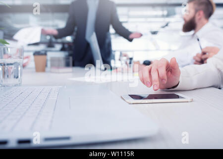 Businesswoman works on a mobile phone. Concept of internet sharing and interconnection Stock Photo