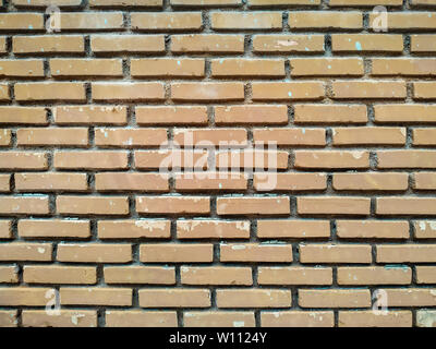 Old grunge orange brick wall background. Stock Photo