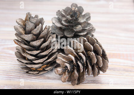 Fir cones on a wooden background. Stock Photo