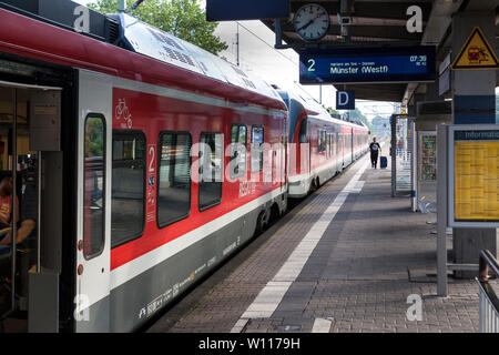 Commuter train on the station Stock Photo