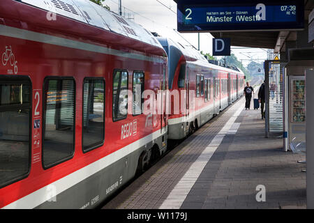 Commuter train on the station Stock Photo