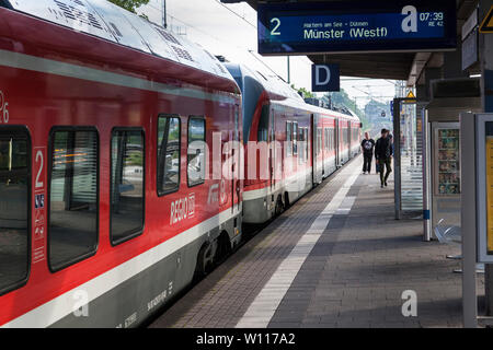 Commuter train on the station Stock Photo