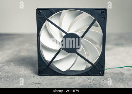 Computer Cooler Fan CPU or PC Case on Dark Background Stock Photo