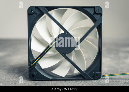 Computer Cooler Fan CPU or PC Case on Dark Background Stock Photo
