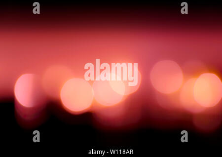 Defocused of light LED light on black background. Bokeh photo of LED light. Stock Photo