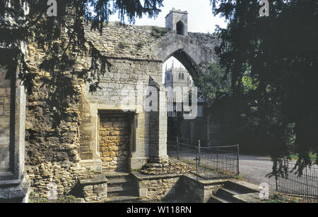 Ramsey Abbey Gatehouse and St Thomas A Becket C Of E Church, Cambridgeshire, England, UK Stock Photo