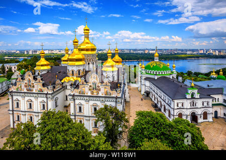 Kiev, Ukraine, golden domes of christian orthodox Dormition cathedral in Kyiv Monastery of the Caves or Kiev Pechersk Lavra on Dniepr river Stock Photo