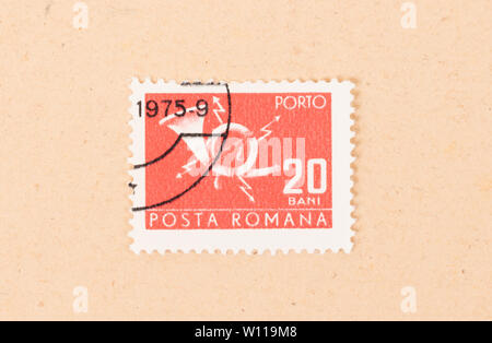 ROMANIA - CIRCA 1975: A stamp printed in Romania shows an old horn, circa 1975 Stock Photo