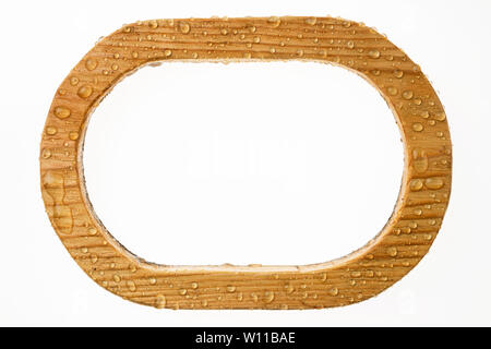 Beautiful wooden frame in raindrops on white background. Top view Stock Photo