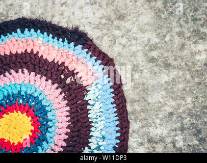 homemade door mat  carpet colorful outside on the ground Stock Photo
