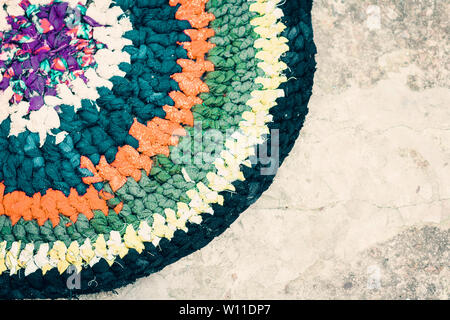 homemade door mat  carpet colorful outside on the ground Stock Photo