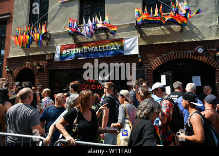 People gather for an event marking the 50th anniversary of the Stonewall Inn uprising in New York on June 28, 2019. Stock Photo