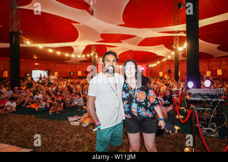 Glastonbury, UK. Saturday, 29 June, 2019. Himesh Patel, who plays Jack Malik in Yesterday, and Helen O'Hara of Empire magazine before a screening of the film at Pilton Palais Cinema on Day 4 (Saturday) of the 2019 Glastonbury Festival at Worthy Farm in Somerset. Photo: Roger Garfield/Alamy Live News Stock Photo