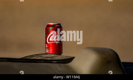 Gardnerville, NV, USA- January 10, 2019. Coca-cola can on the dashboard of a car in the desert, selective focus Stock Photo
