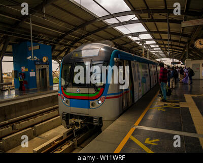 Hyderabad, India - June 17, 2019 : Rapid transit Hyderabad metro train enters a station in the morning. The service has successfully completed one yea Stock Photo