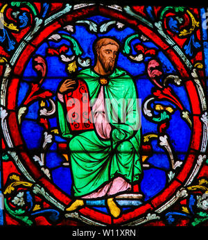 Stained Glass in the Cathedral of Notre Dame, Paris, France, depicting Moses carrying the Stone Tablets with the Ten Commandments
